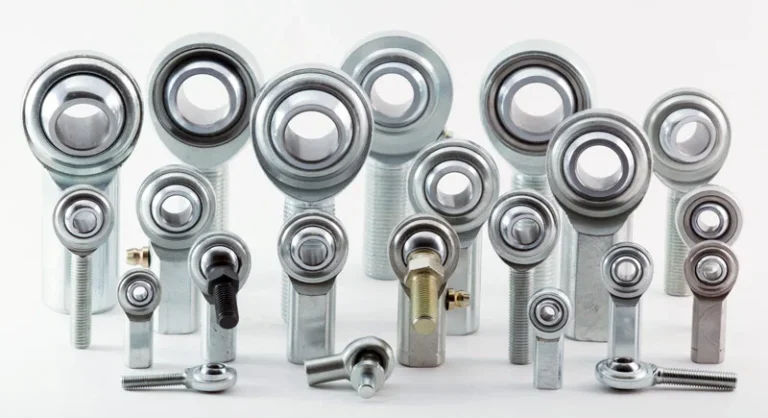 Assorted rod ends in multiple sizes arranged in rows