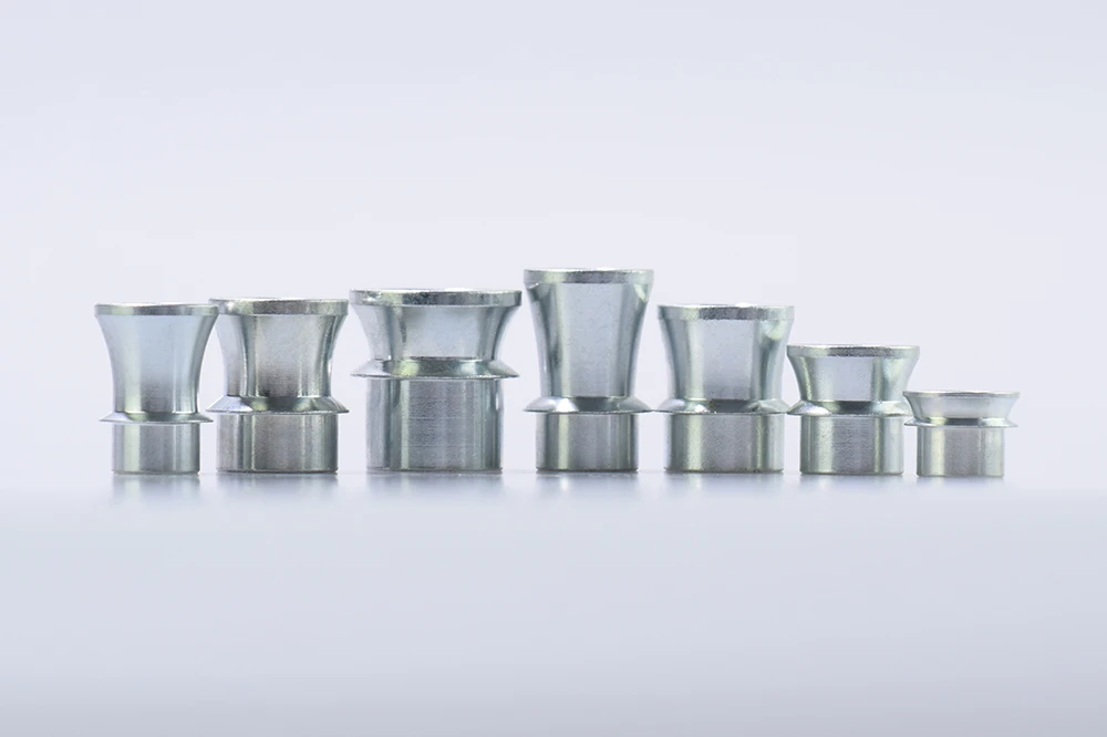 High misalignment spacers for spherical joints