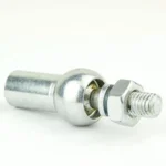 Close-up of a metal bolt with a hex nut and cylindrical coupling on a white background.